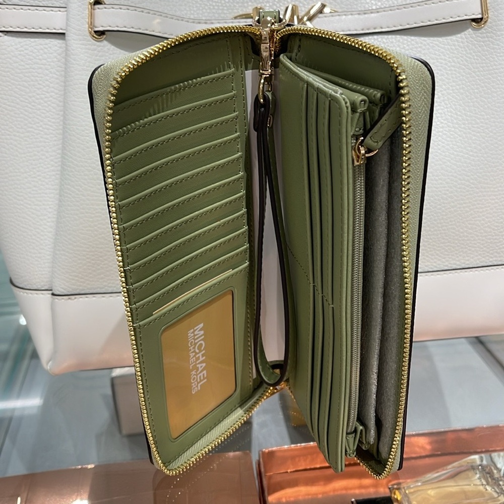 MICHAEL KORS
Leather Continental Wristlet Phone Case Wallet 
Light Sage
NWT - Picture 15 of 16